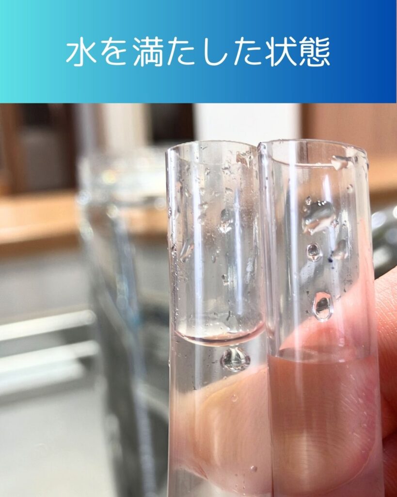 サイフォンの原理。水と容器とホースで実験。灯油ポンプが例。手順３